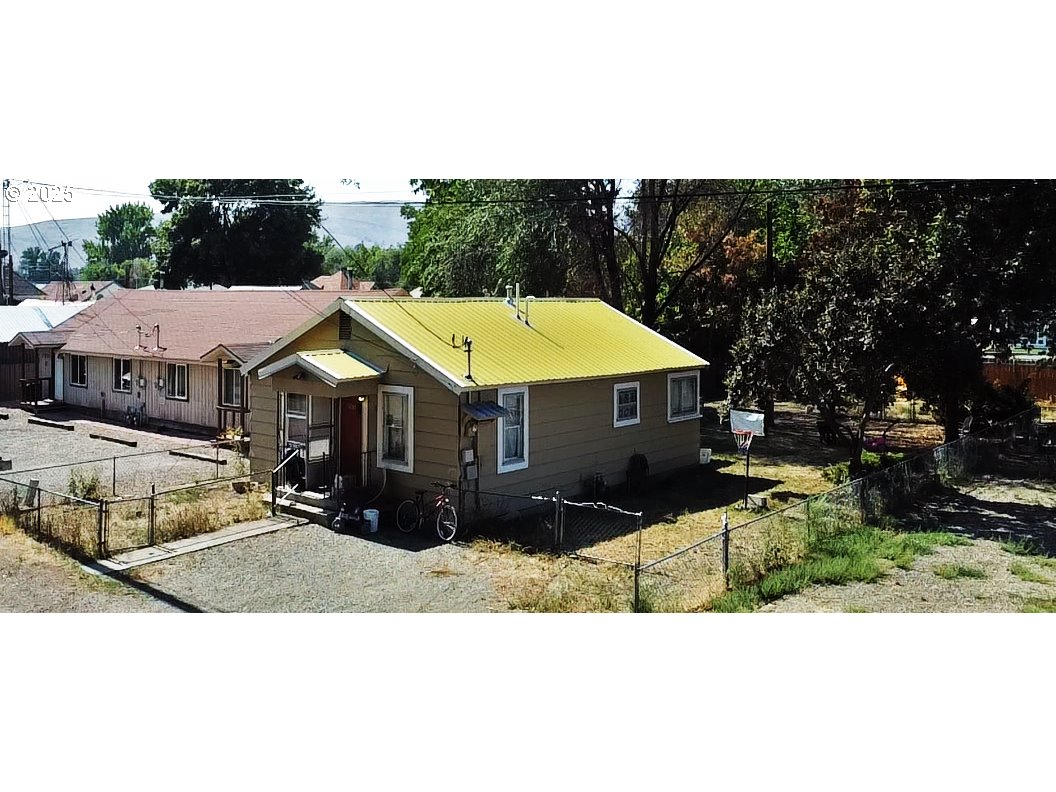 a terrace of a house with outdoor seating