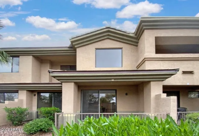 a house view with a outdoor space
