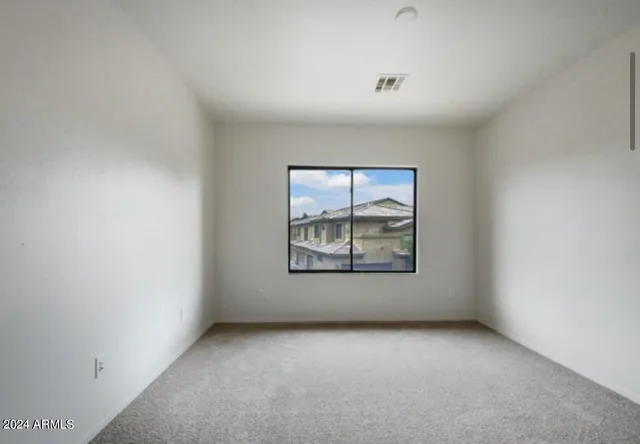 an empty room with window