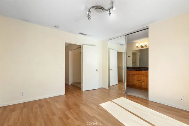 a view of a bathroom with a sink and a mirror