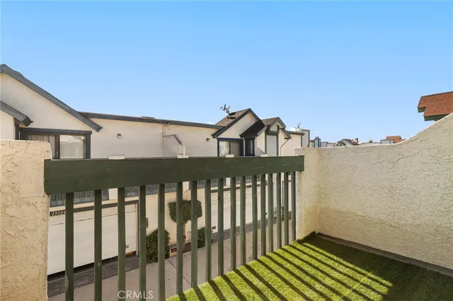 a view of a houses with a balcony