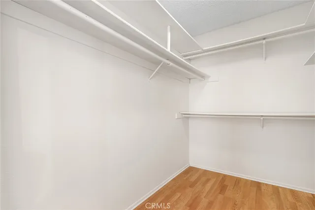 a view of a room with racks on the wall