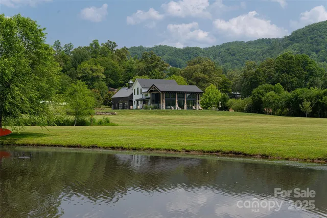 a view of a lake with a yard