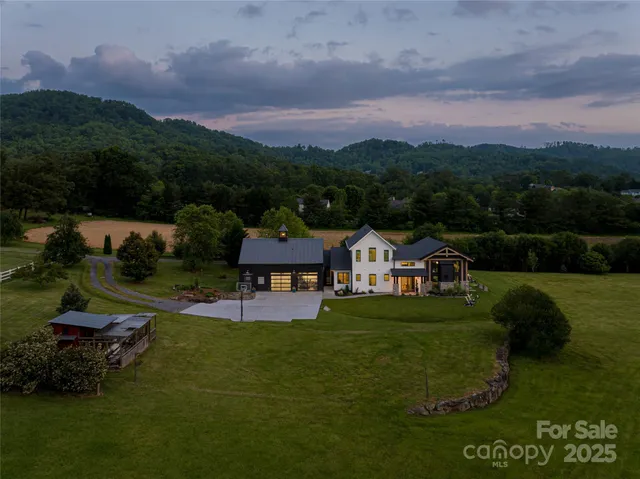 a view of a house with a big yard