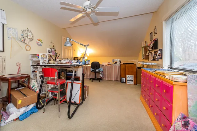 a view of gym equipment and windows