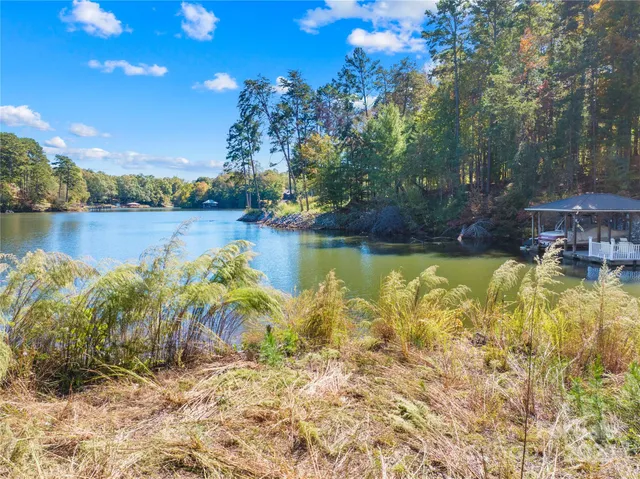 a view of a lake with a house