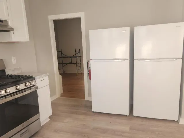 a room with a window and a sink