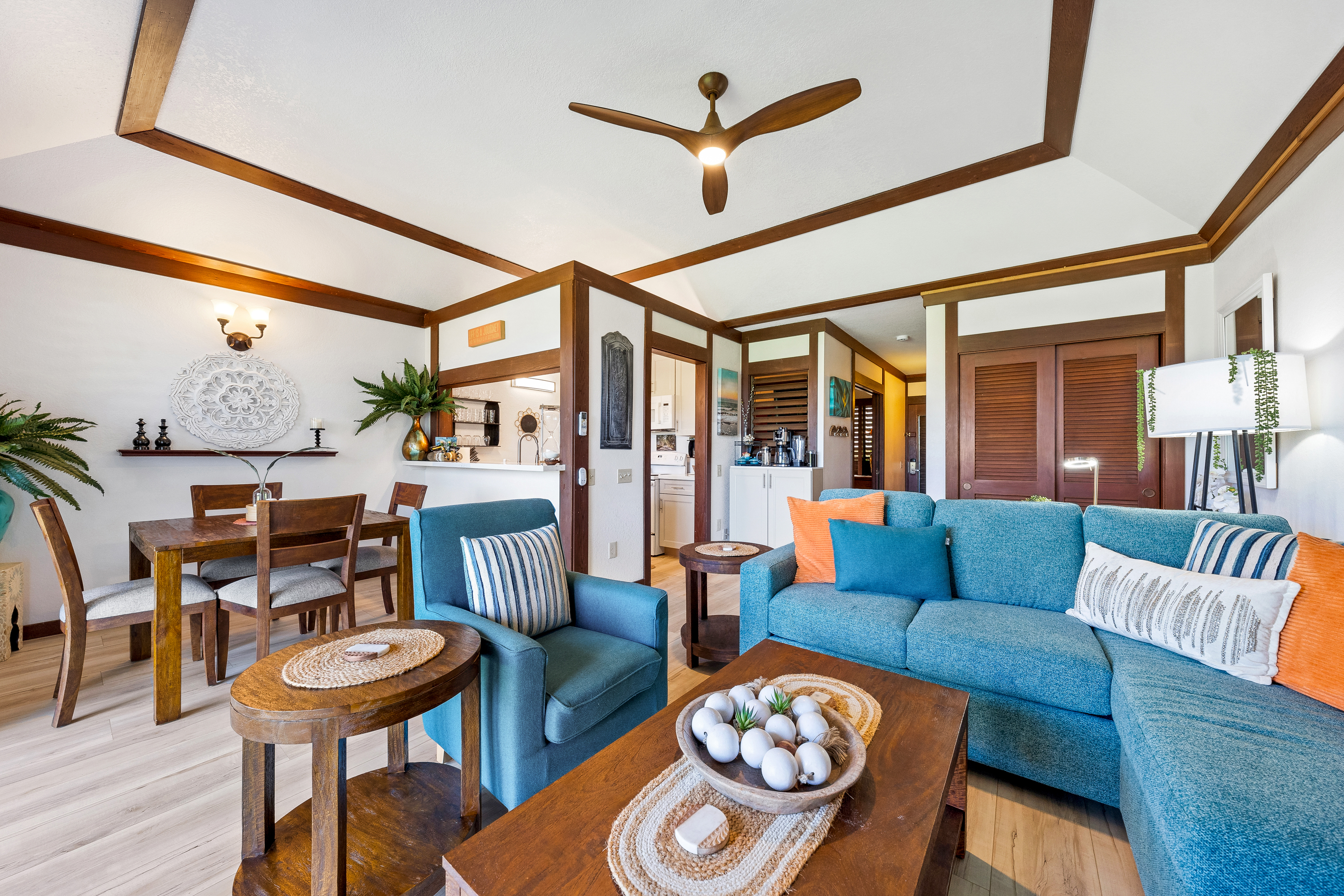 2253 Poipu Road, Unit 85 Koloa, HI 96756 - Photo 1 of 14 a living room with furniture and a large window