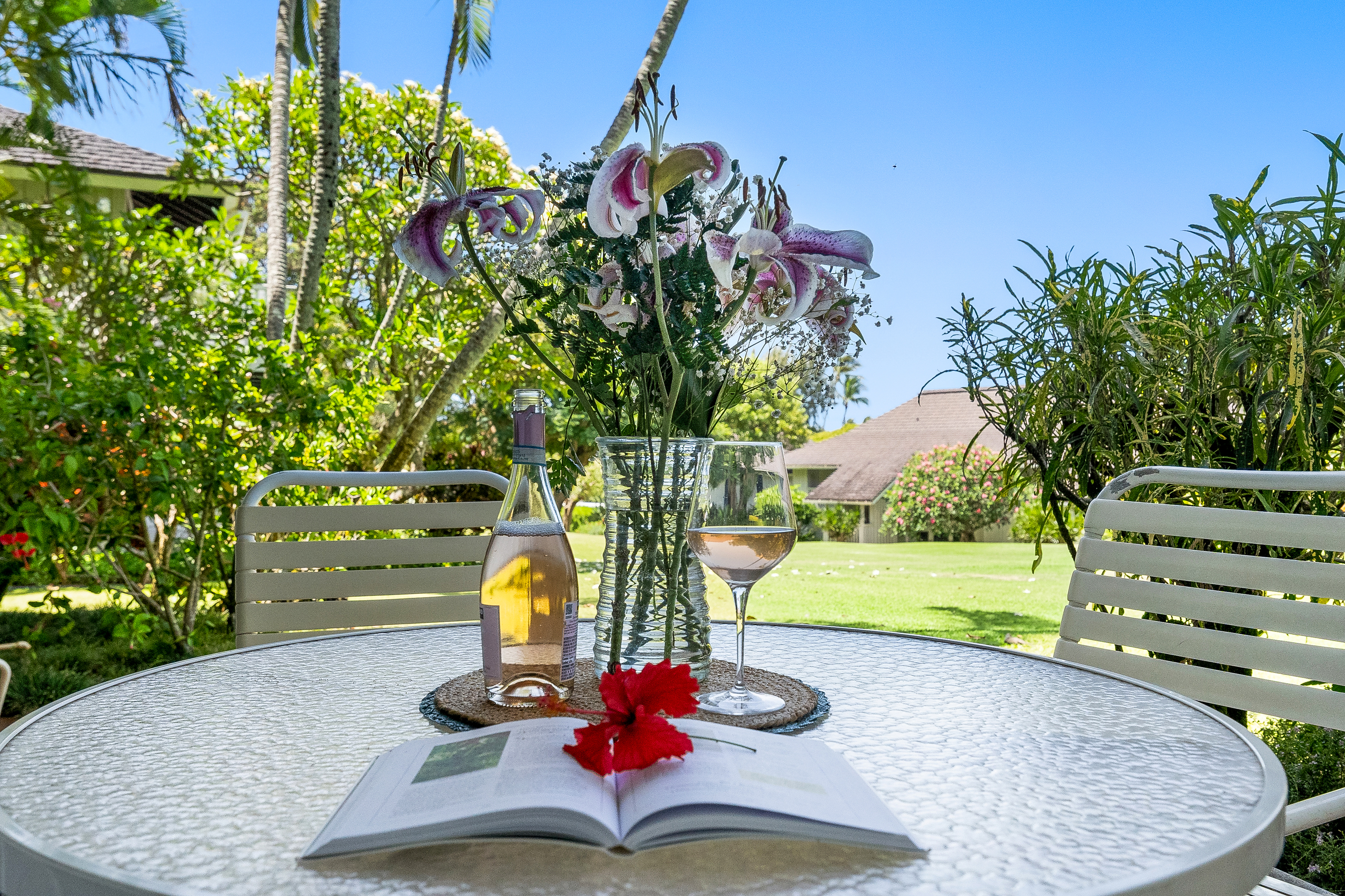 2253 Poipu Road, Unit 85 Koloa, HI 96756 - Photo 14 of 14 a vase of flowers sitting on a table