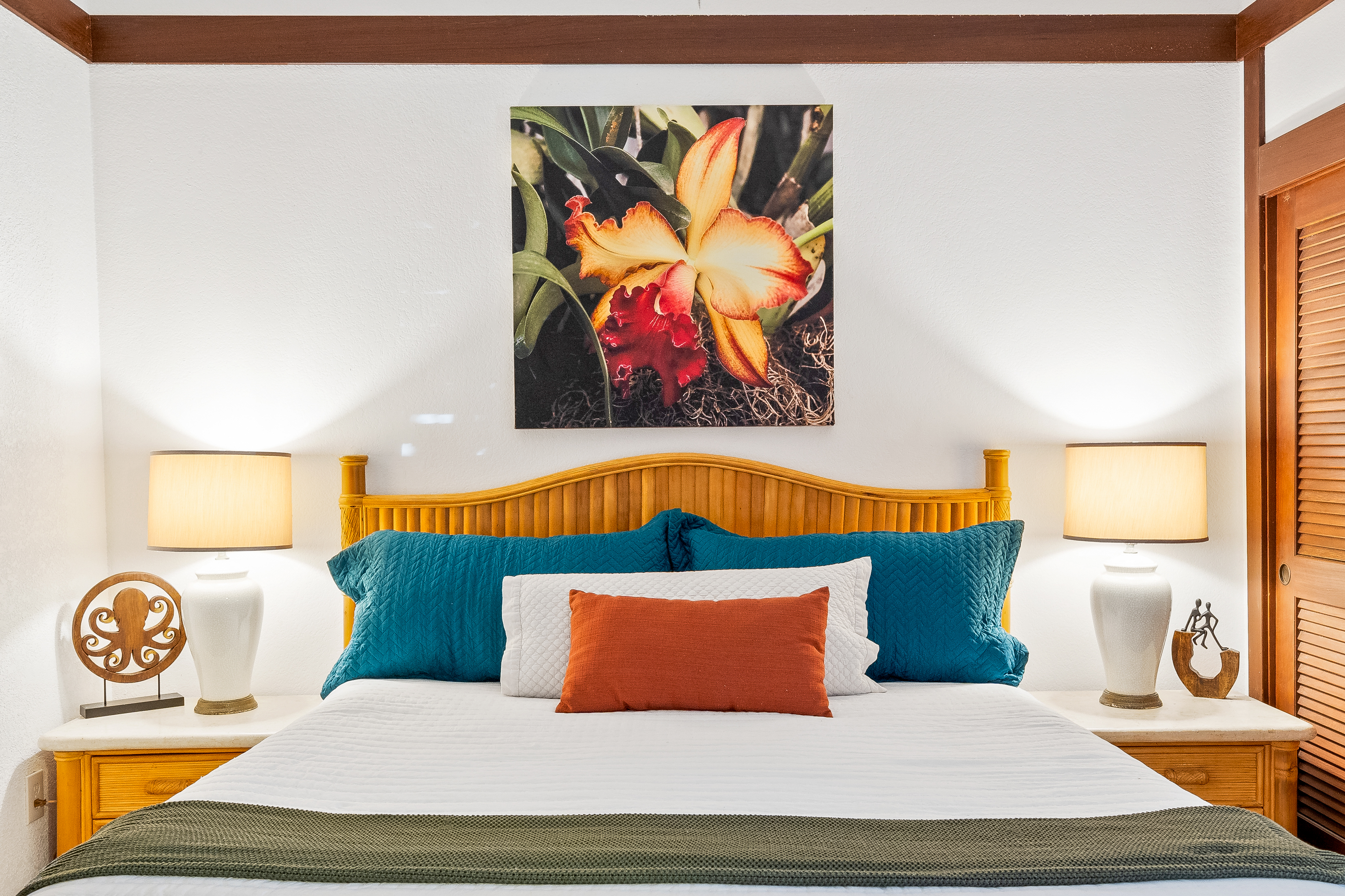 2253 Poipu Road, Unit 85 Koloa, HI 96756 - Photo 10 of 14 a bedroom with a bed and cupboard