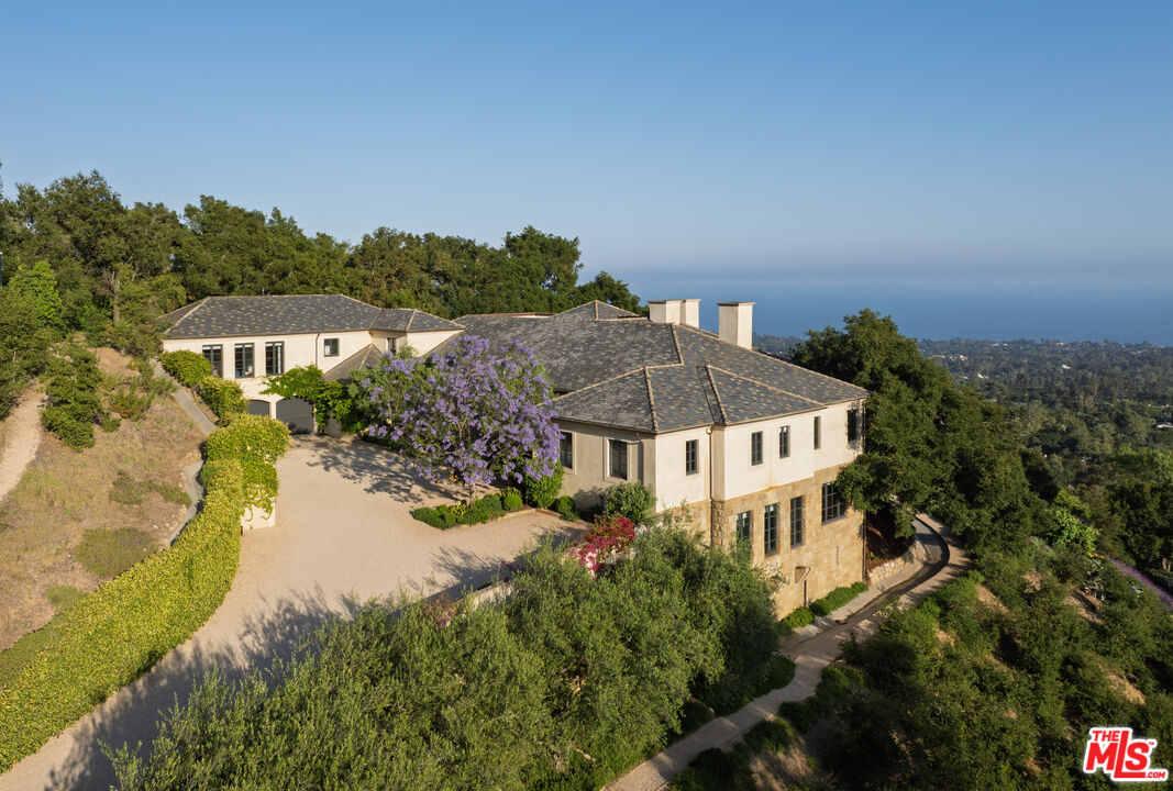 1140 East Mountain Drive Santa Barbara, CA 93108 - Photo 14 of 42 an aerial view of a house with a yard and lake view