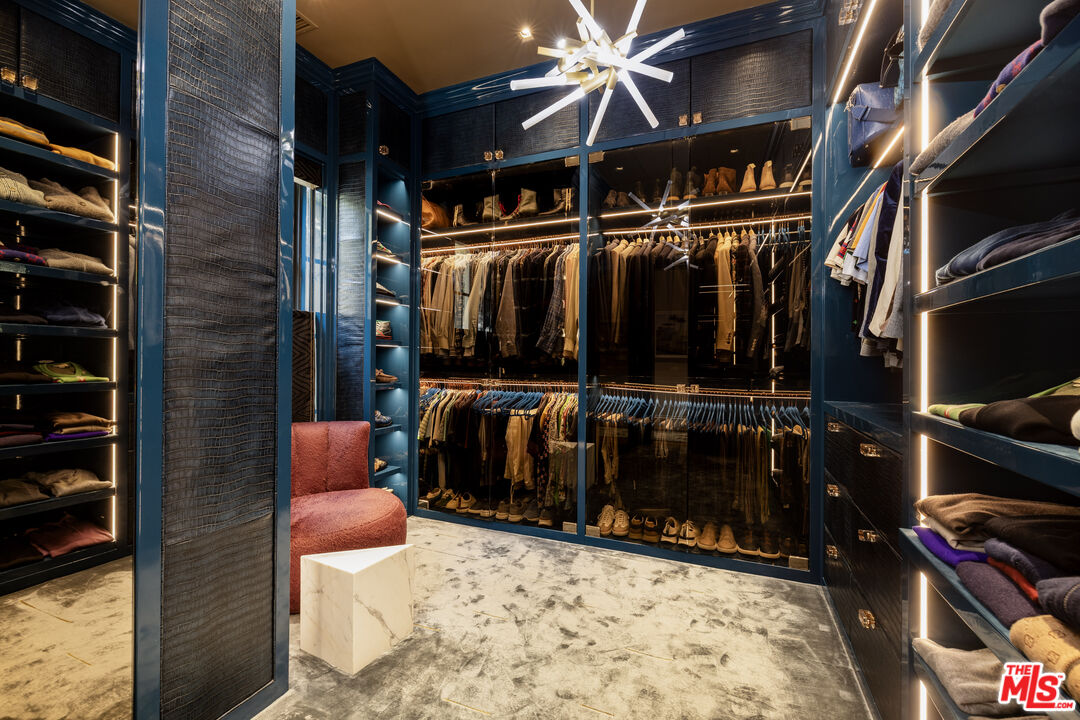 1140 East Mountain Drive Santa Barbara, CA 93108 - Photo 18 of 42 a view of walk in closet with clothes and shoes