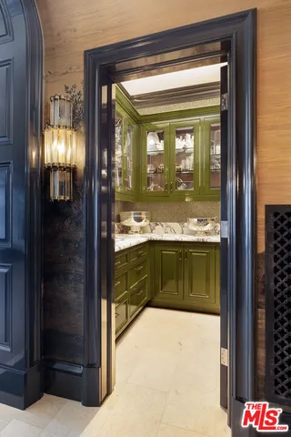 a bathroom with mirror vanity and shower