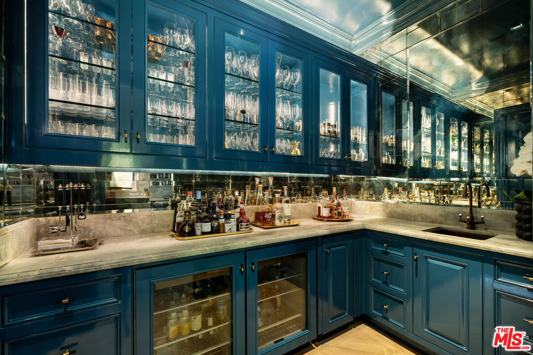 1140 East Mountain Drive Santa Barbara, CA 93108 - Photo 23 of 42 a kitchen with a sink and cabinets