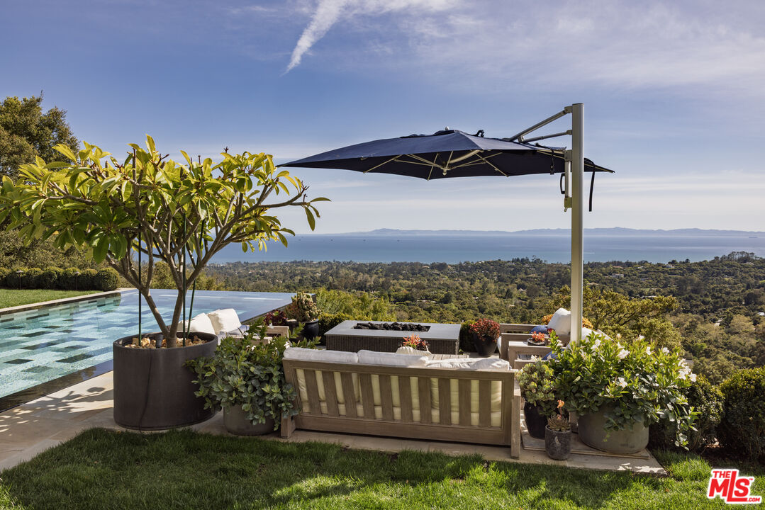 1140 East Mountain Drive Santa Barbara, CA 93108 - Photo 37 of 42 a view of a chairs and table in the patio