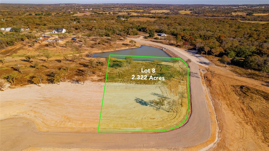 Lot 8 Suade Way Weatherford, TX 76088 - Photo 2 of 18 a view of a swimming pool with a mountain view