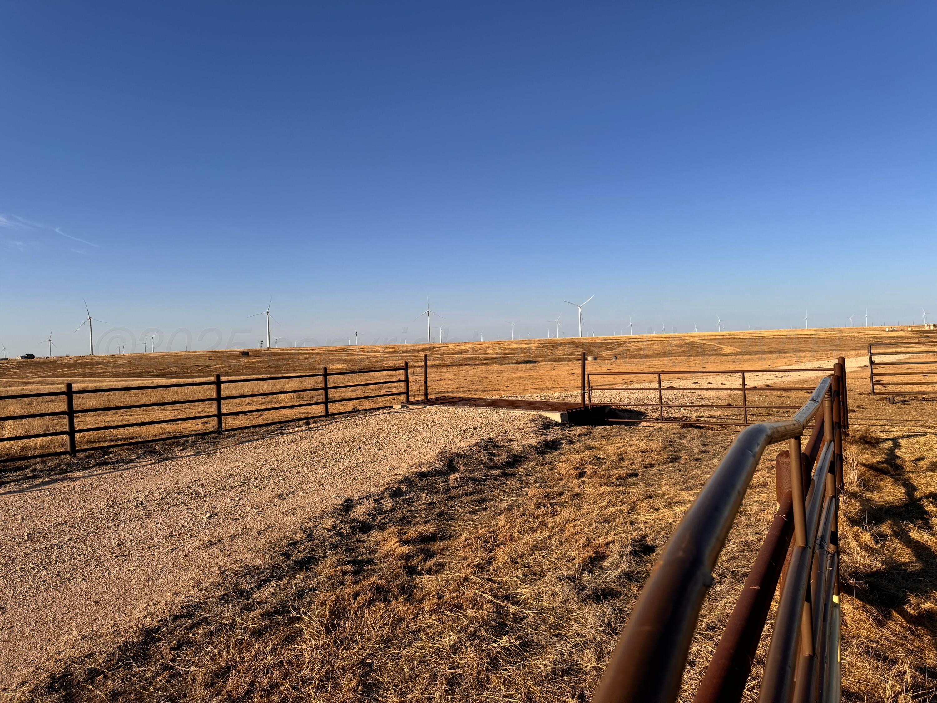 0 South Loop Road Miami, TX 79059 - Photo 29 of 33 a view of a dry yard with wooden fence