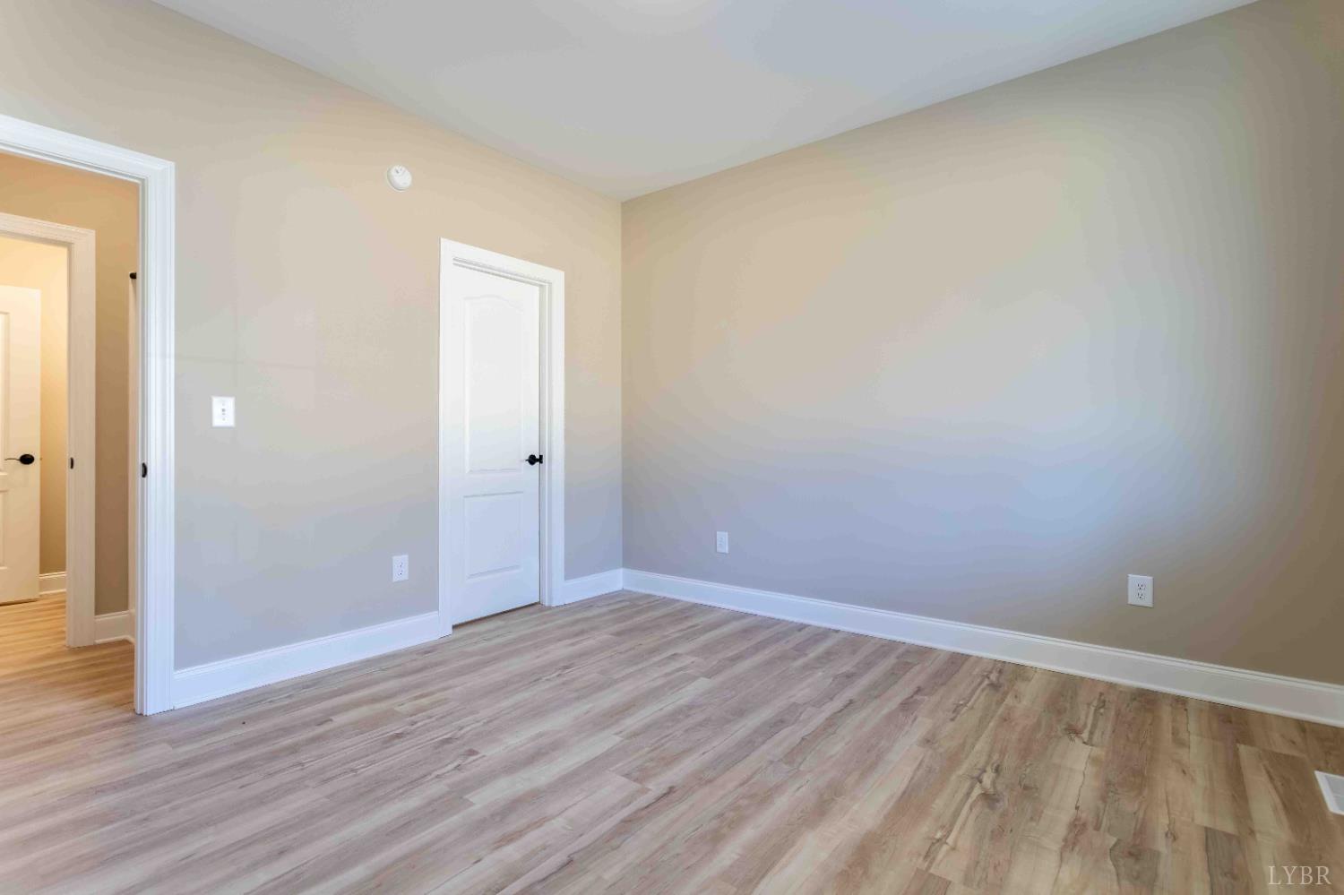 1115 Thornblade Way Blue Ridge, VA 24064 - Photo 18 of 44 wooden floor in an empty room