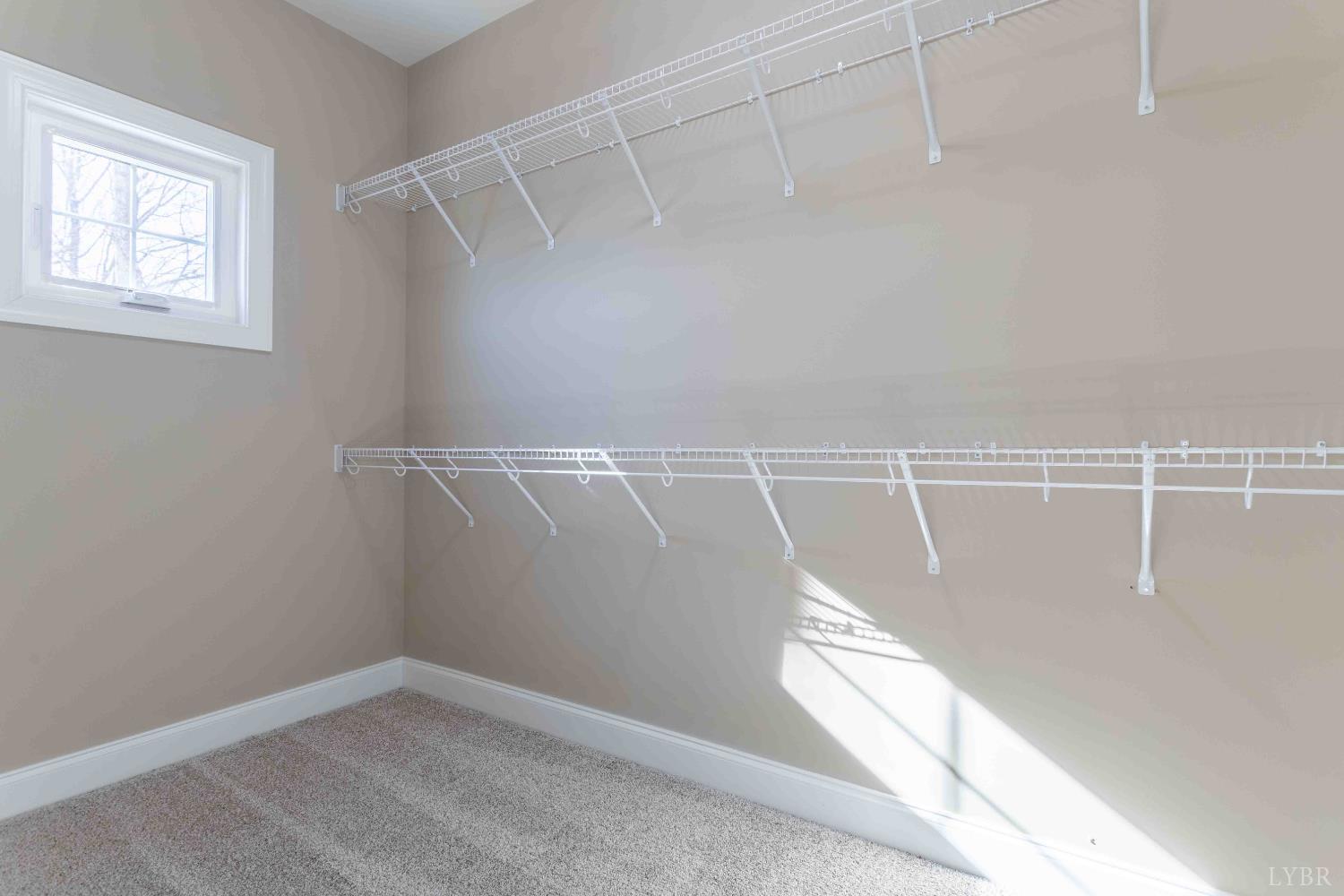 1115 Thornblade Way Blue Ridge, VA 24064 - Photo 34 of 44 a view of an empty walk in closet