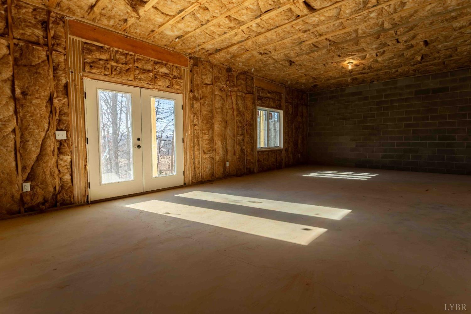 1115 Thornblade Way Blue Ridge, VA 24064 - Photo 38 of 44 a view of an empty room with windows