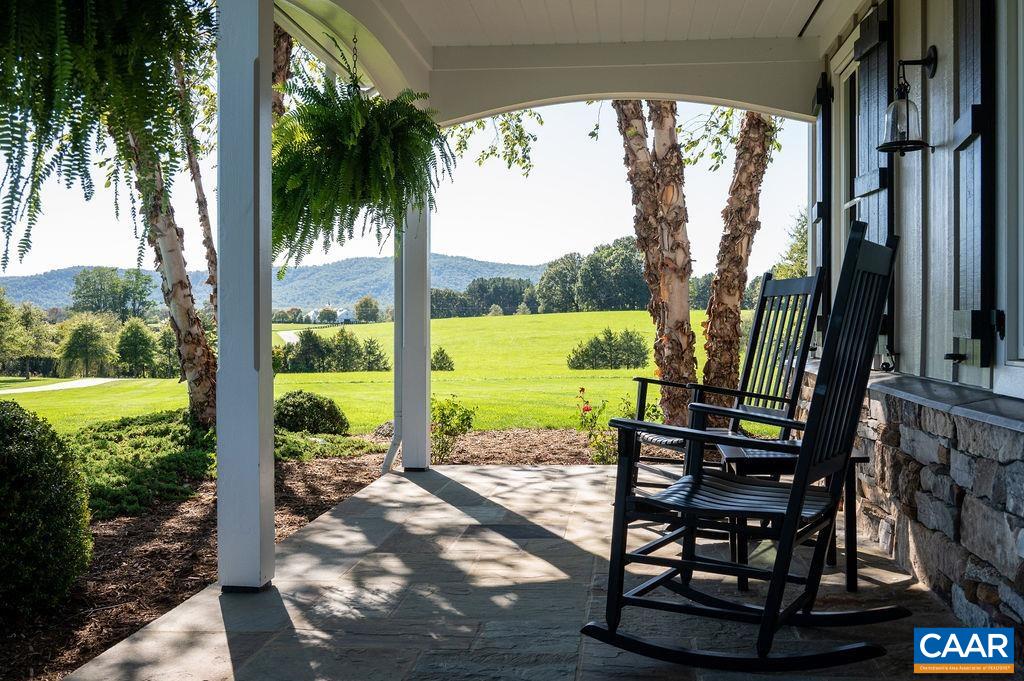 5095 Wesley Chapel Road Free Union, VA 22940 - Photo 1 of 75 a view of a swimming pool with a patio