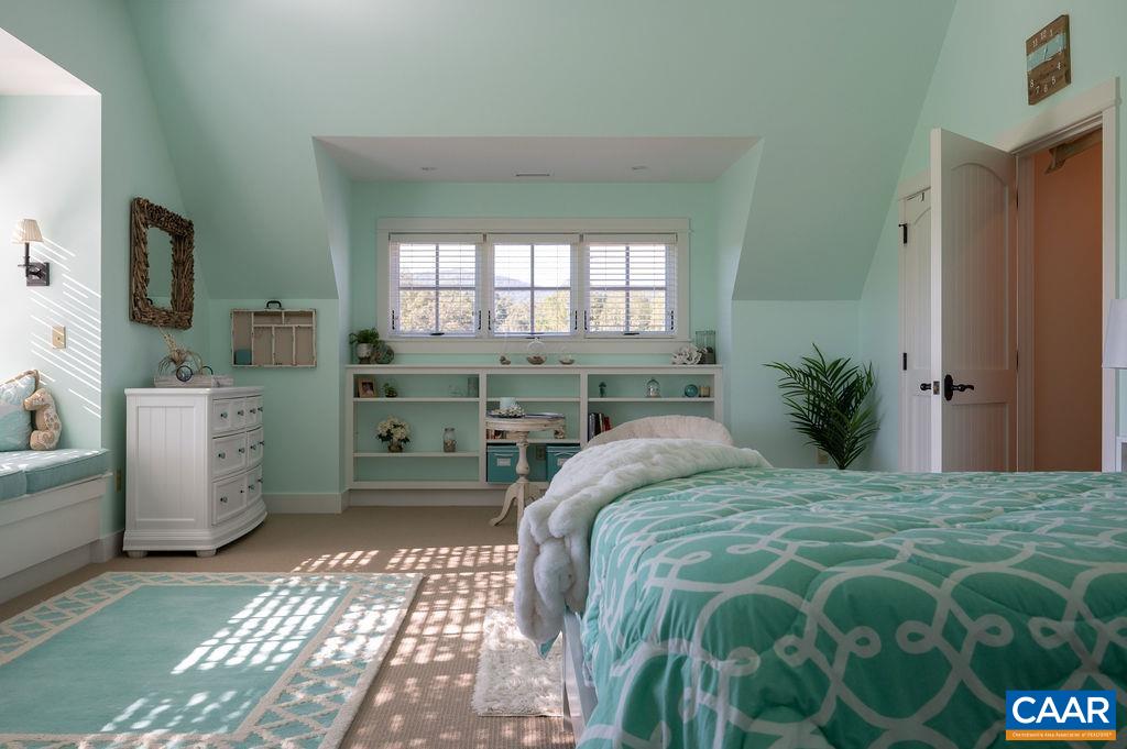 5095 Wesley Chapel Road Free Union, VA 22940 - Photo 41 of 75 a bedroom with a bed and a window