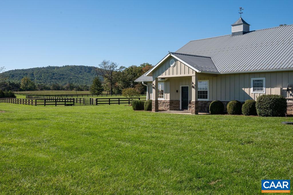5095 Wesley Chapel Road Free Union, VA 22940 - Photo 57 of 75 a front view of a house with a garden