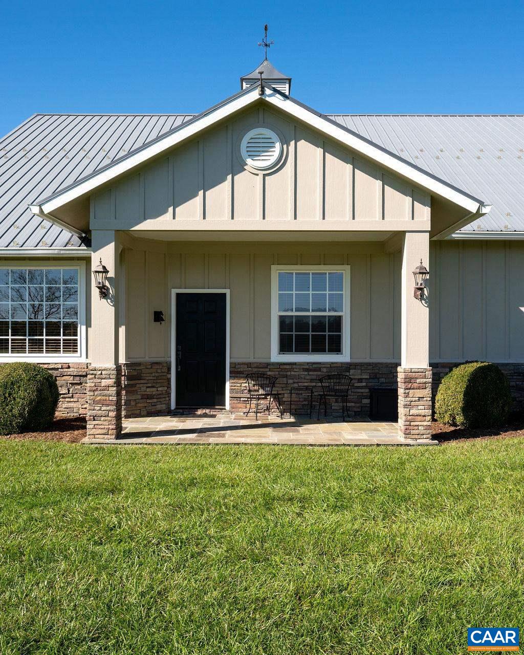 5095 Wesley Chapel Road Free Union, VA 22940 - Photo 58 of 75 a front view of a house with a yard
