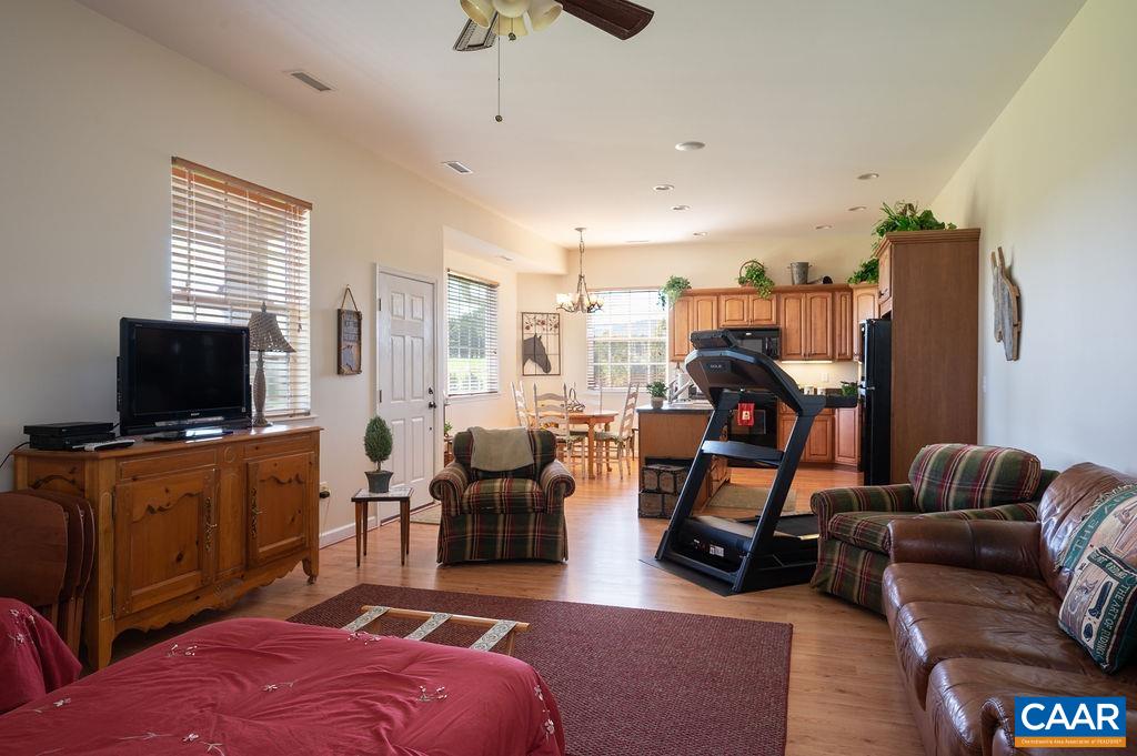 5095 Wesley Chapel Road Free Union, VA 22940 - Photo 62 of 75 a living room with furniture and a flat screen tv