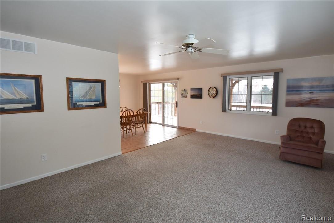9100 Lapeer Road Mayville, MI 48744 - Photo 23 of 40 Living Room W/Ceiling Fan