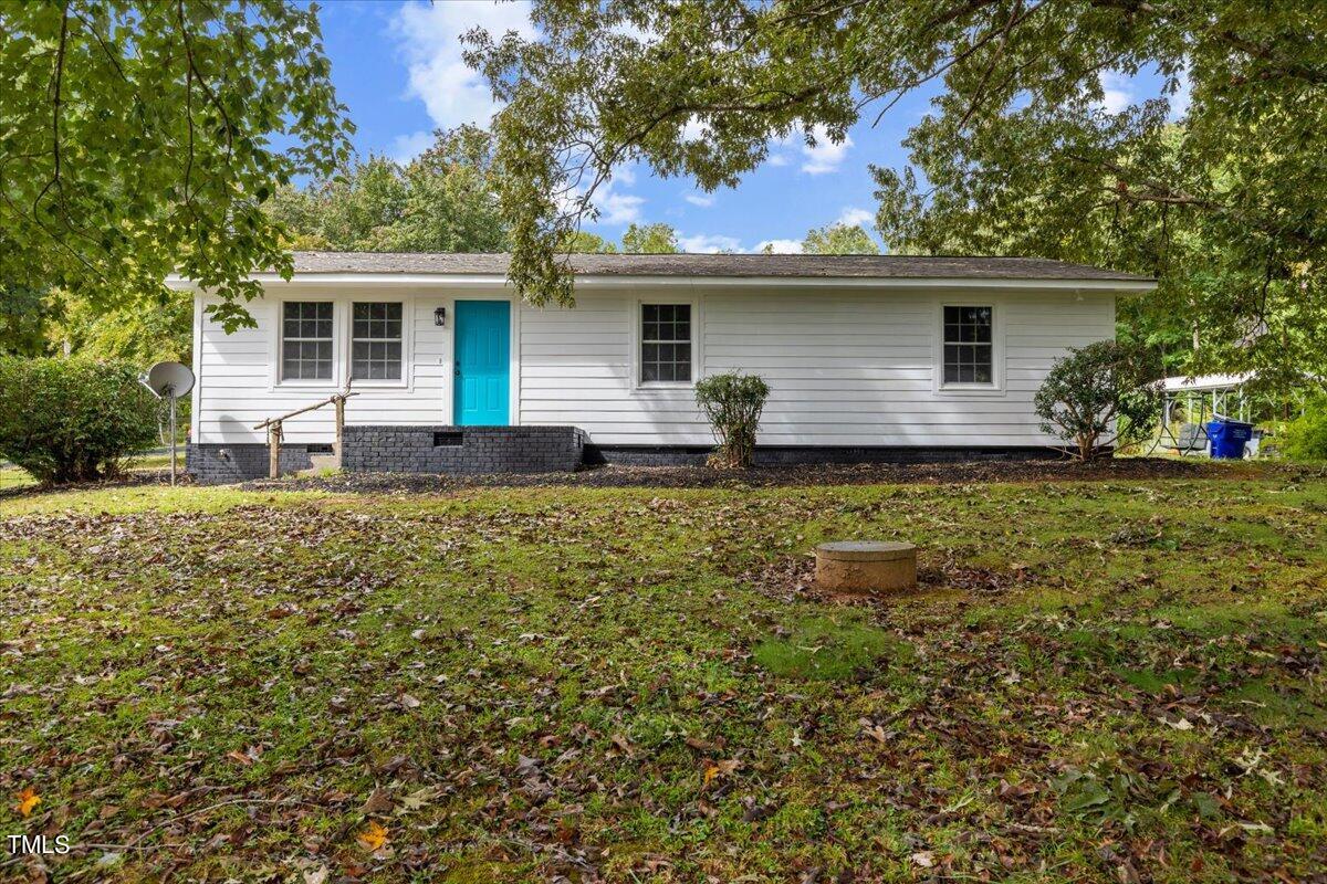 4721 Kimbro Road Hillsborough, NC 27278 - Photo 11 of 11 a house view with a garden space