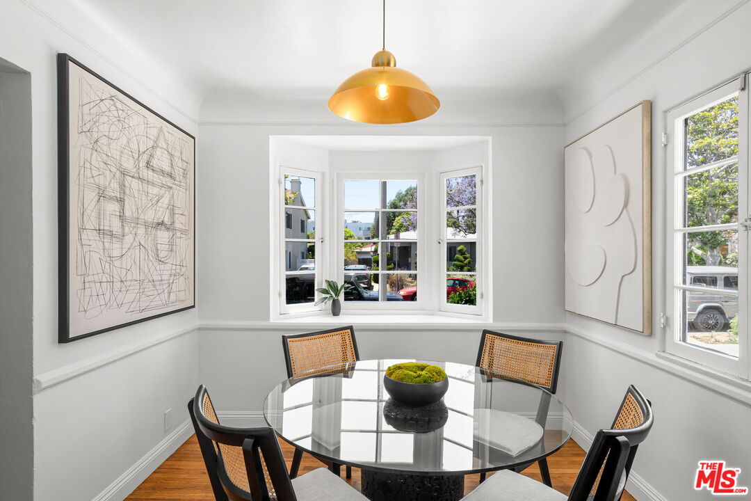 3340 Cardiff Avenue Los Angeles, CA 90034 - Photo 14 of 49 a dining room with furniture and window