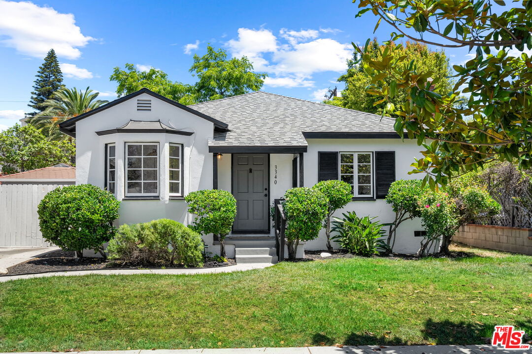 3340 Cardiff Avenue Los Angeles, CA 90034 - Photo 48 of 49 a front view of a house with a yard