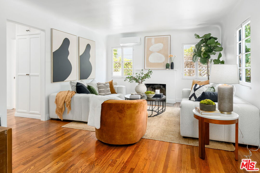 3340 Cardiff Avenue Los Angeles, CA 90034 - Photo 6 of 49 a living room with furniture and a wooden floor