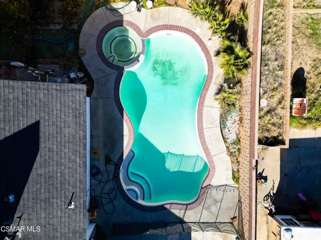 an aerial view of a swimming pool