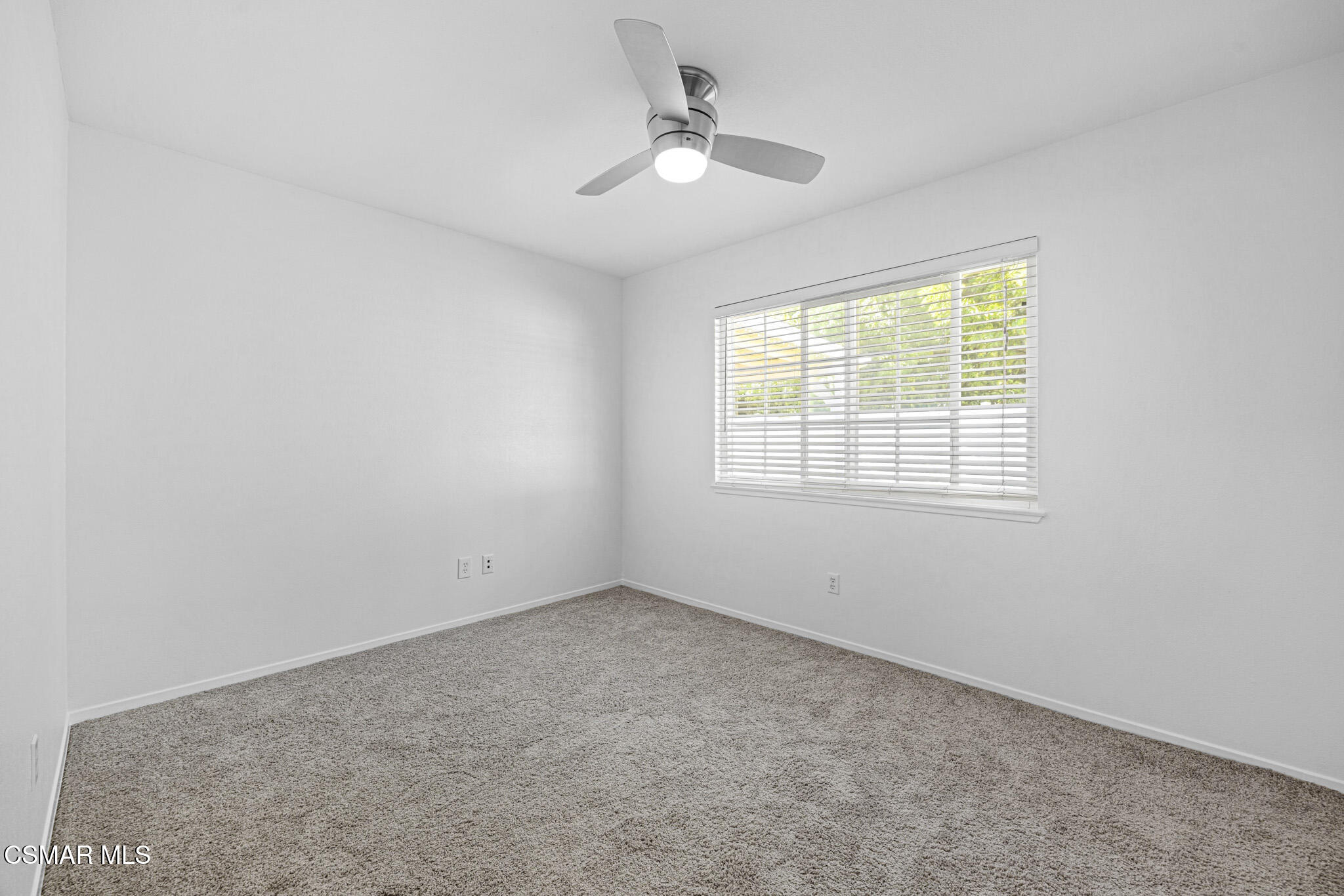 1521 Church Street Simi Valley, CA 93065 - Photo 11 of 16 an empty room with a window and a ceiling fan