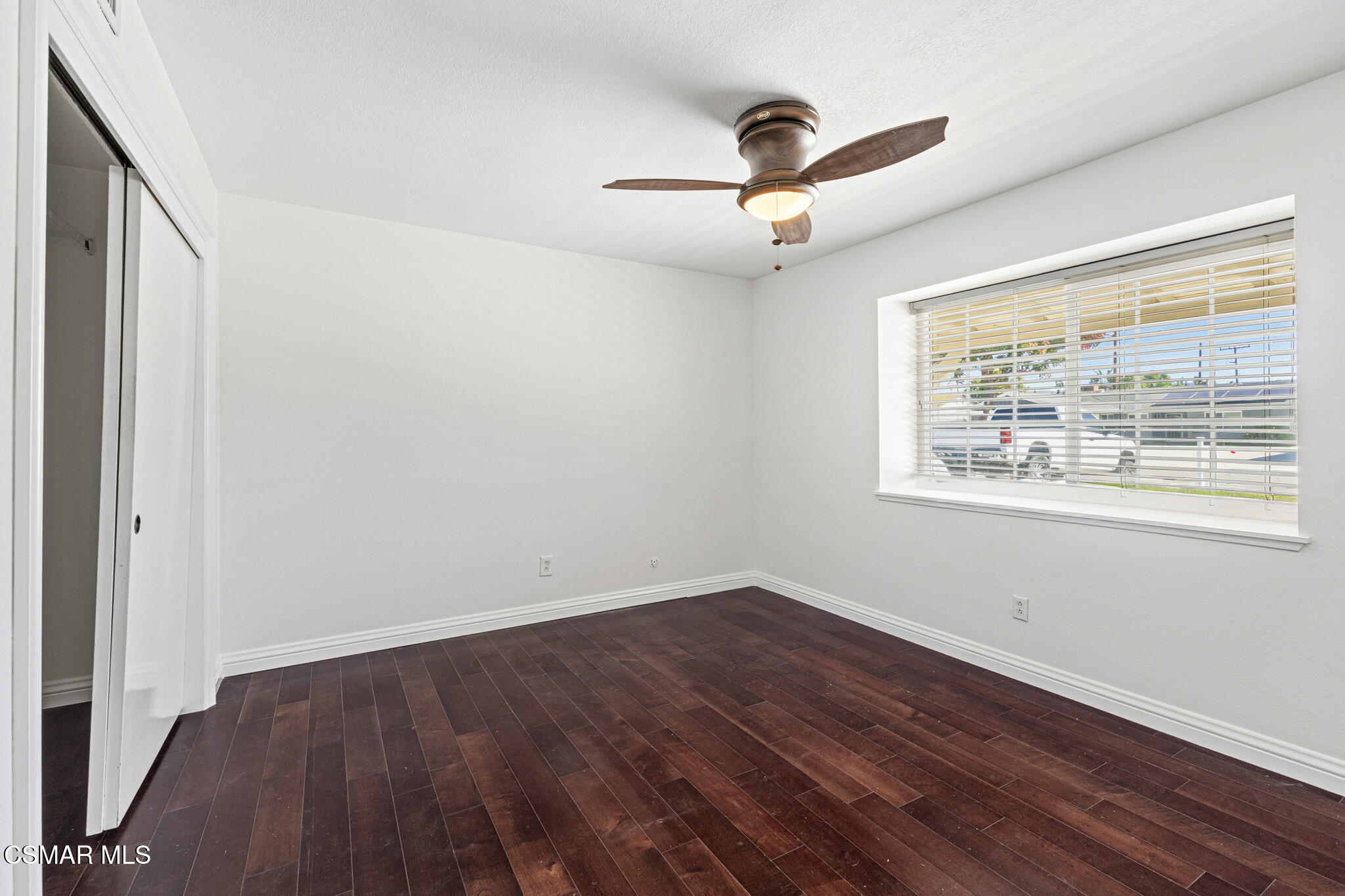 1521 Church Street Simi Valley, CA 93065 - Photo 9 of 16 a view of a big room with wooden floor closet and windows