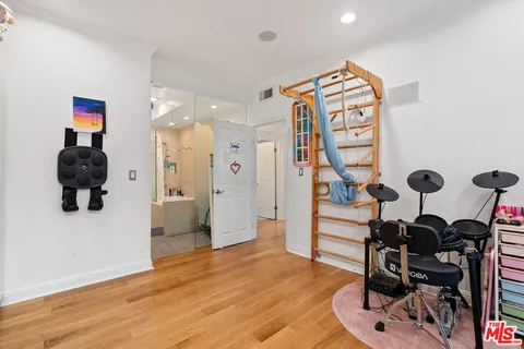 a view of entryway with wooden floor