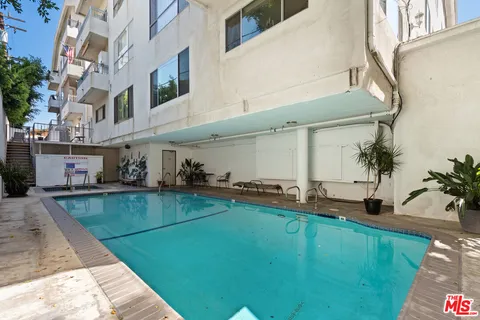 a view of a house with a swimming pool
