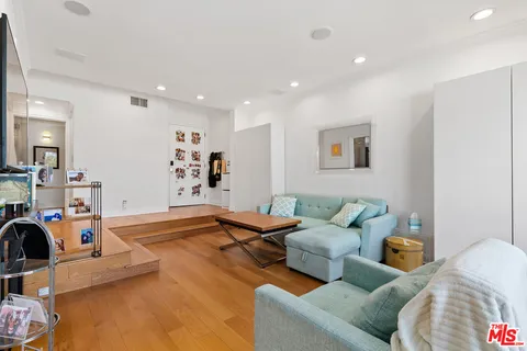 a living room with furniture and a couch