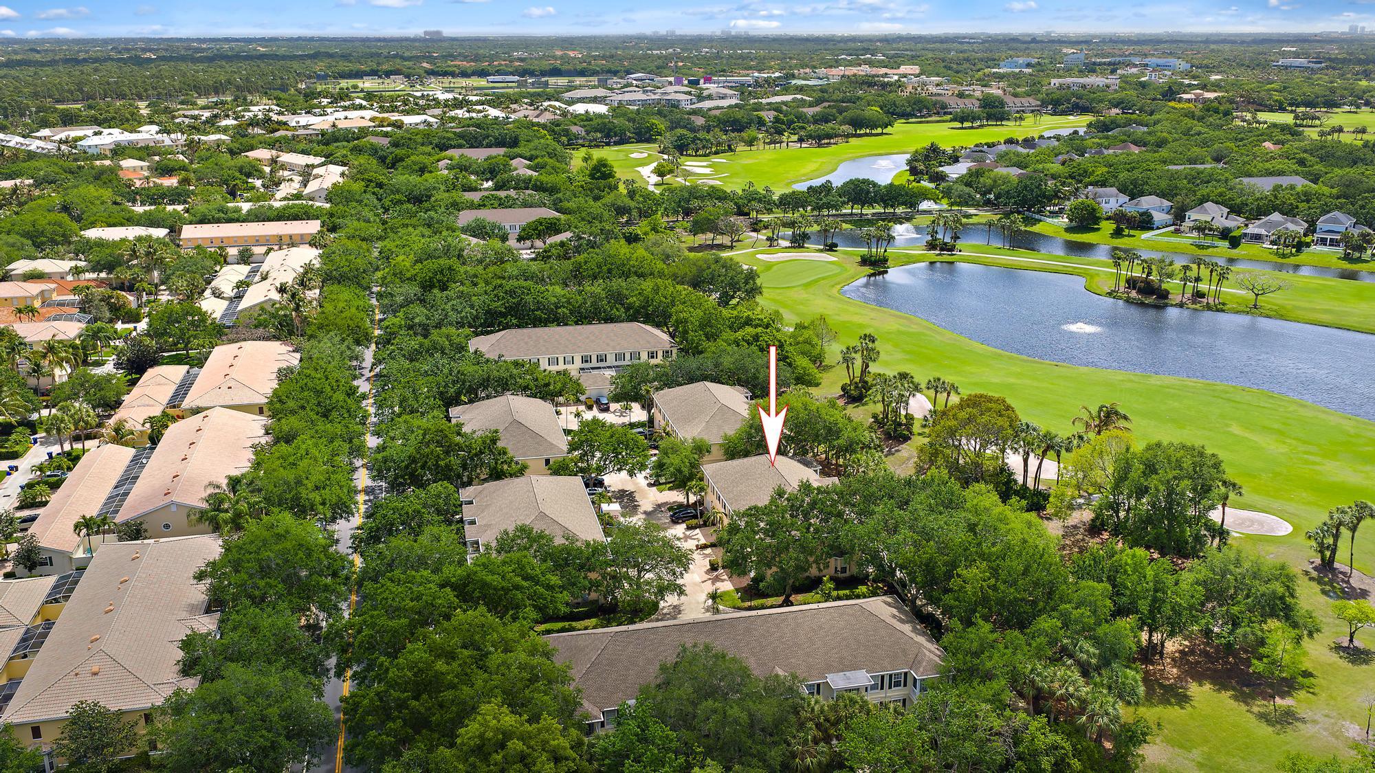 136 Ashley Court Jupiter, FL 33458 - Photo 23 of 26 an aerial view of residential houses with outdoor space