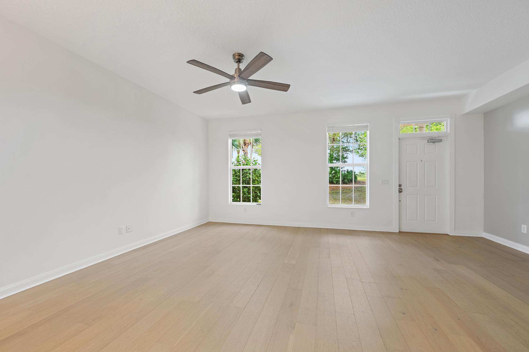 136 Ashley Court Jupiter, FL 33458 - Photo 5 of 26 a view of an empty room with a window