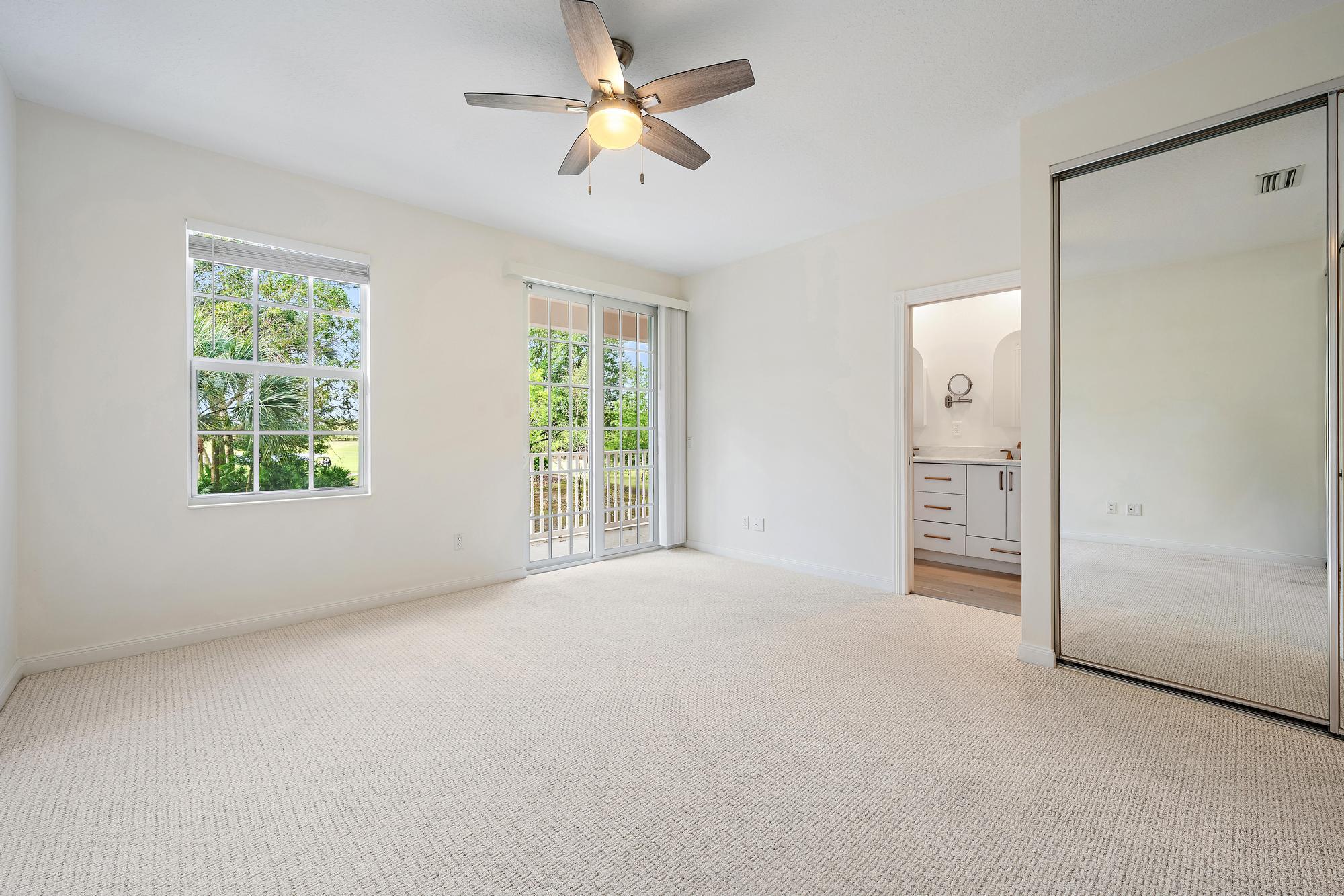 136 Ashley Court Jupiter, FL 33458 - Photo 10 of 26 an empty room with windows and closet