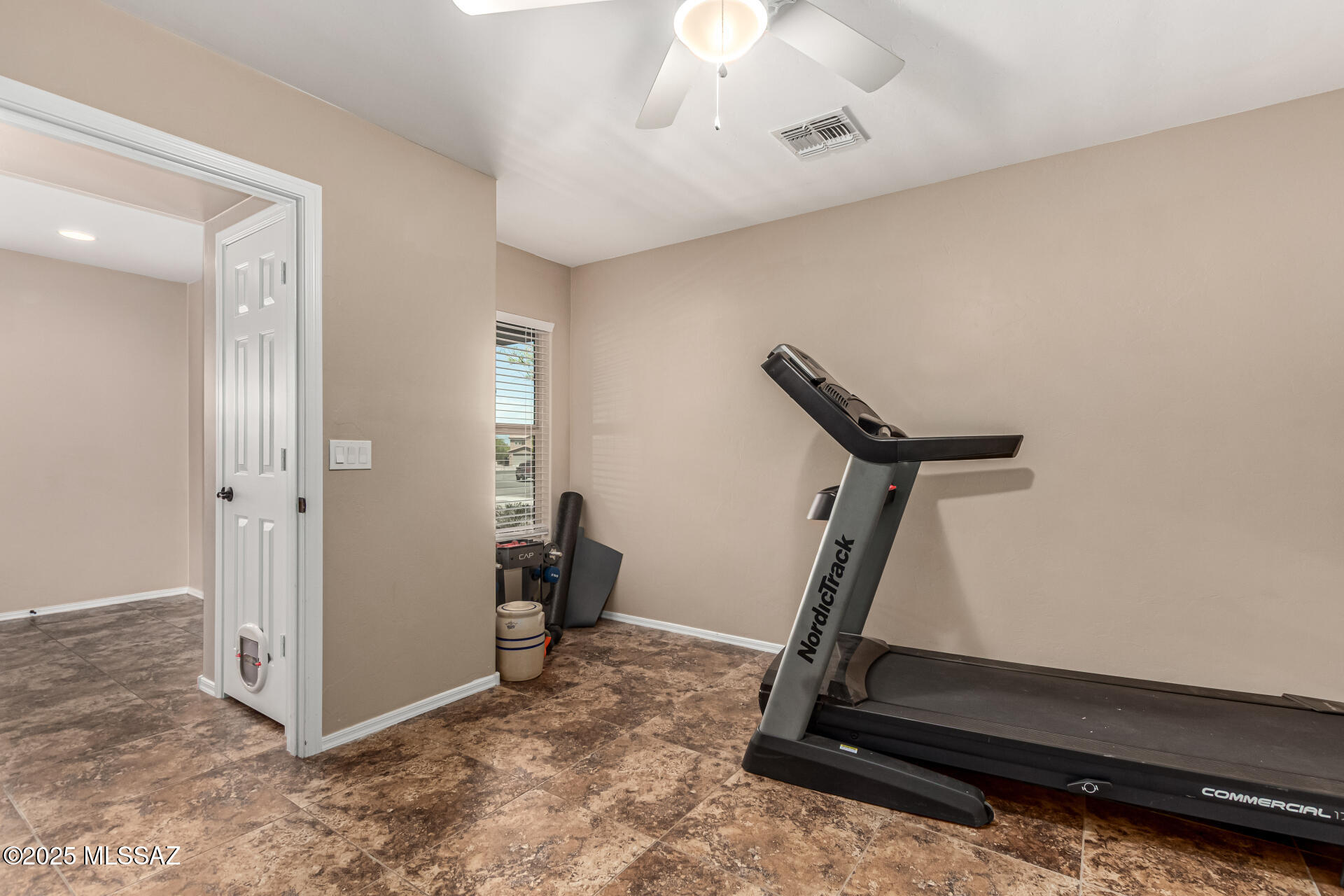 9528 Desert Fauna Loop Tucson, AZ 85747 - Photo 33 of 46 a view of a room with gym equipment