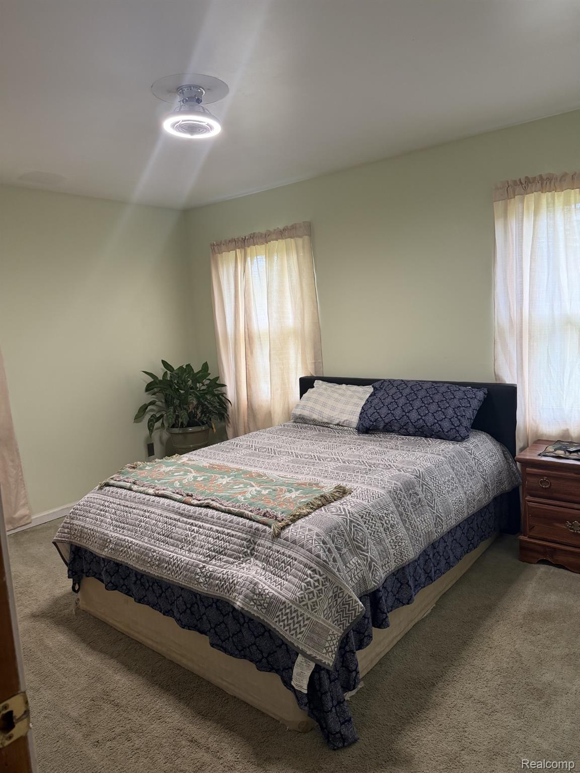 5200 Mayville Road Clifford, MI 48727 - Photo 11 of 17 Bedroom featuring light colored carpet