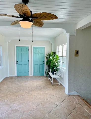 a view of a room with potted plants