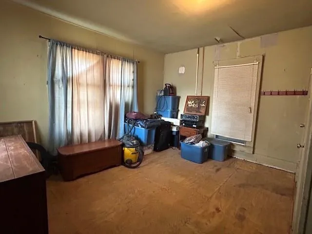 a room with furniture and a window