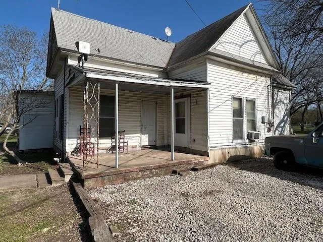 a view of a house with a patio