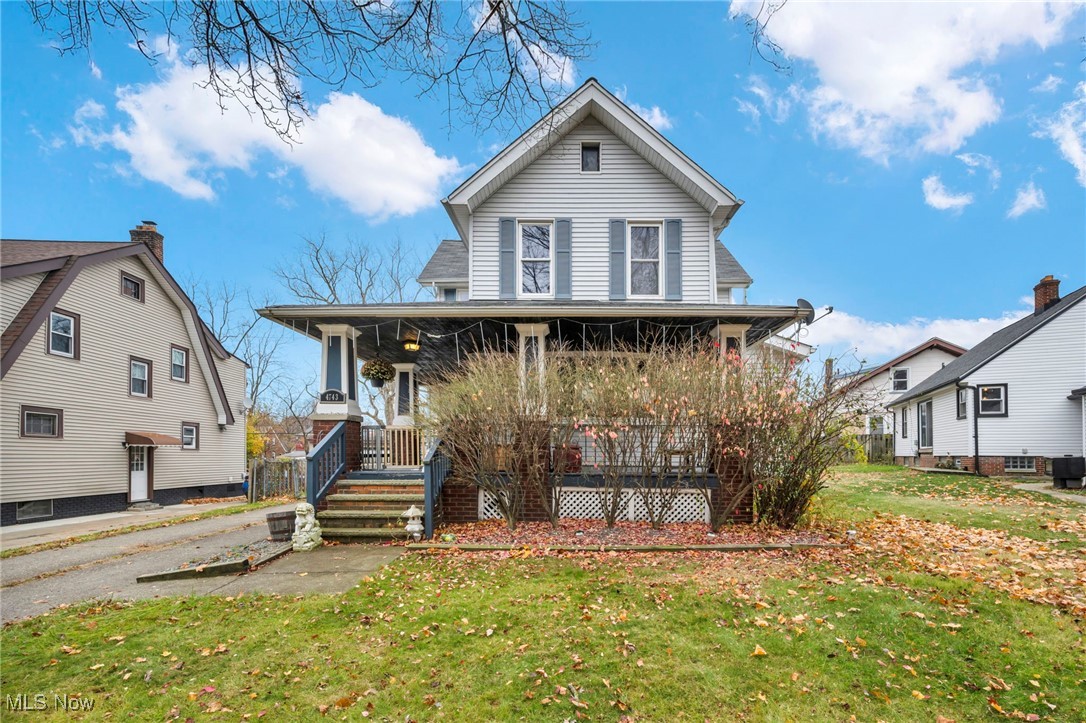 4743 Broadale Road Cleveland, OH 44109 - Photo 1 of 32 Country-style home featuring a front lawn and covered porch