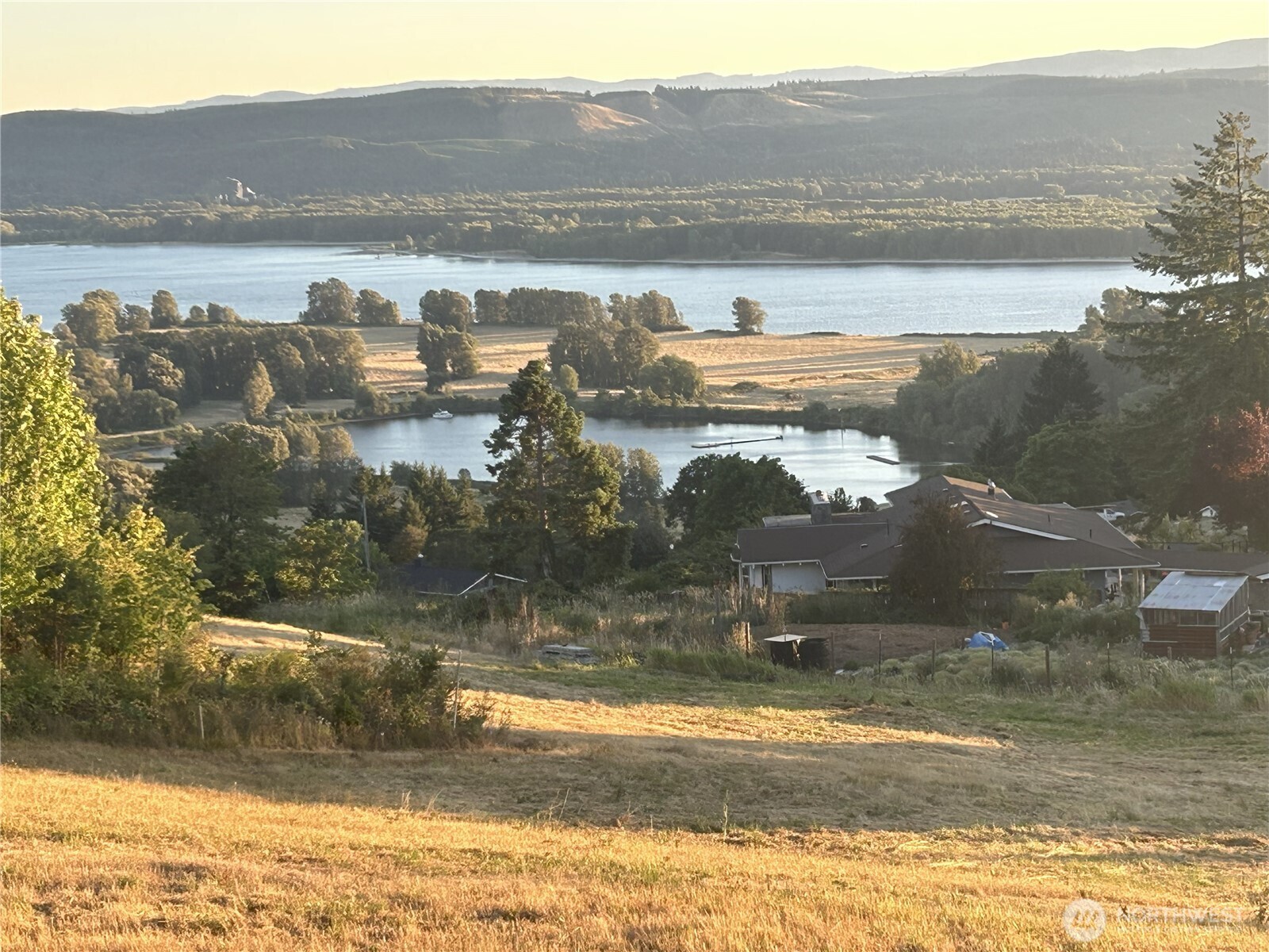 110 Jade Road Woodland, WA 98674 - Photo 1 of 32 a view of lake with mountain